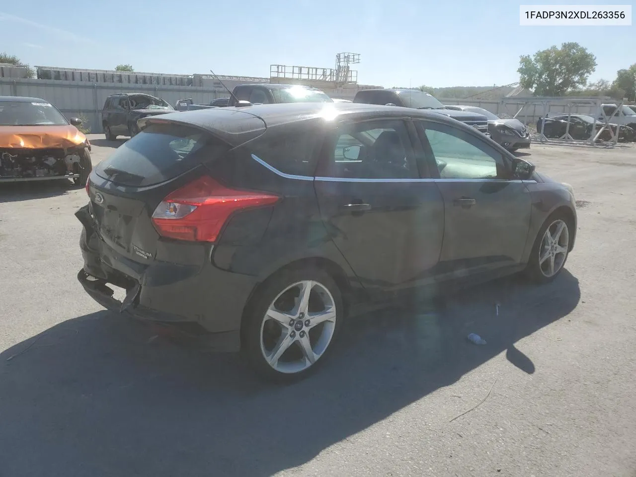 2012 Ford Focus Titanium VIN: 1FADP3N2XDL263356 Lot: 72173744