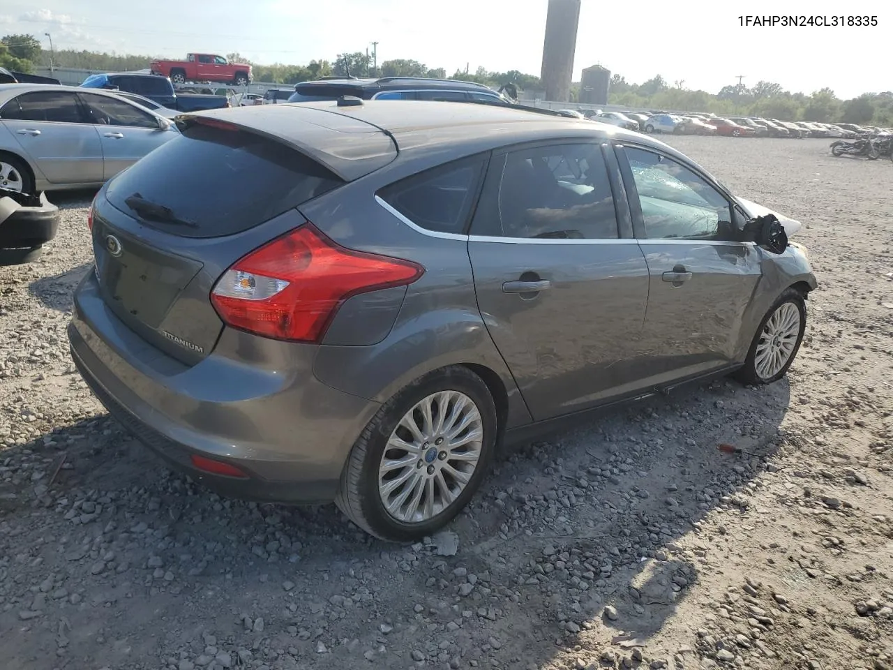 2012 Ford Focus Titanium VIN: 1FAHP3N24CL318335 Lot: 72183114