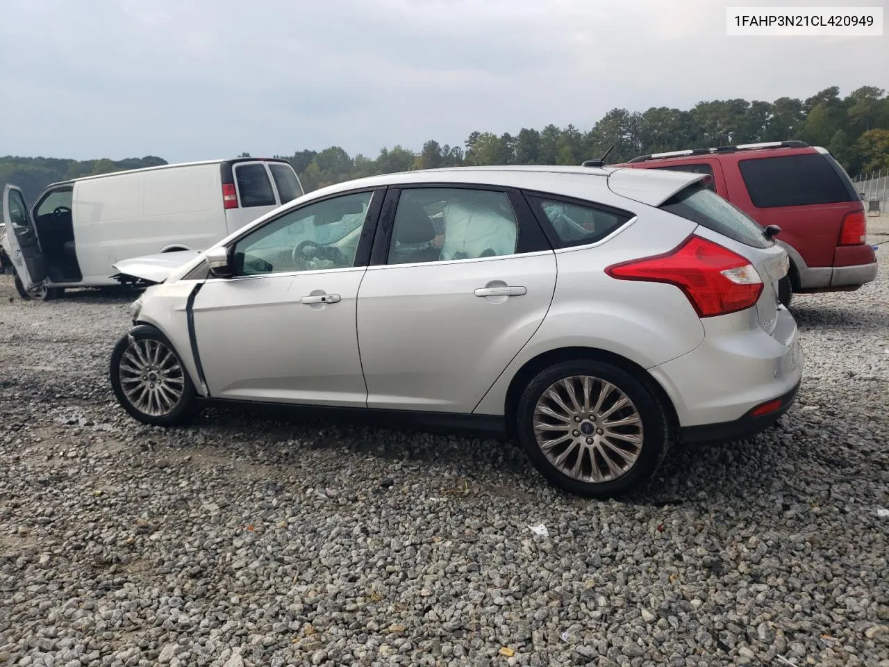 2012 Ford Focus Titanium VIN: 1FAHP3N21CL420949 Lot: 72901874