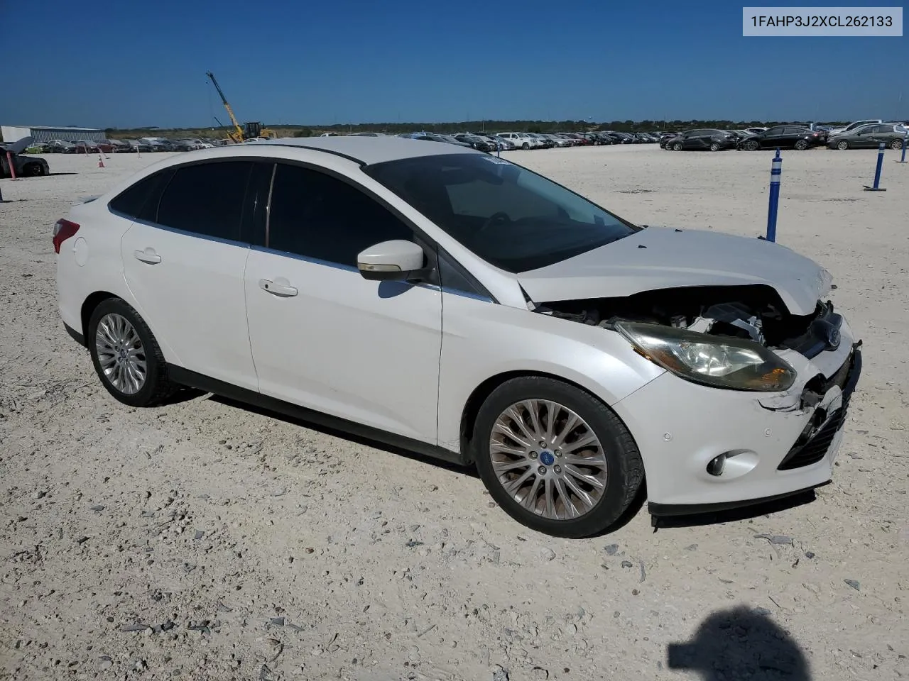 2012 Ford Focus Titanium VIN: 1FAHP3J2XCL262133 Lot: 73649974