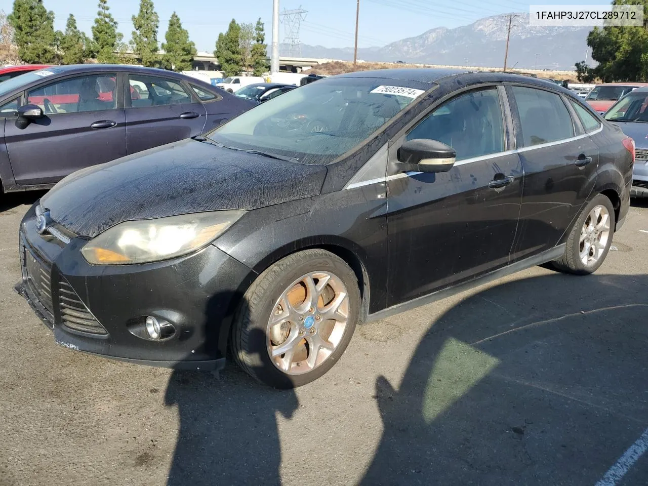 2012 Ford Focus Titanium VIN: 1FAHP3J27CL289712 Lot: 75023574