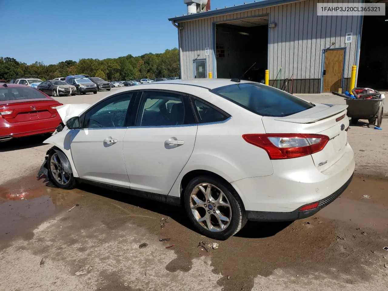 2012 Ford Focus Titanium VIN: 1FAHP3J20CL365321 Lot: 75322264