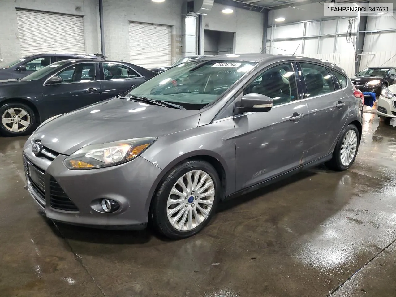 2012 Ford Focus Titanium VIN: 1FAHP3N20CL347671 Lot: 75328754