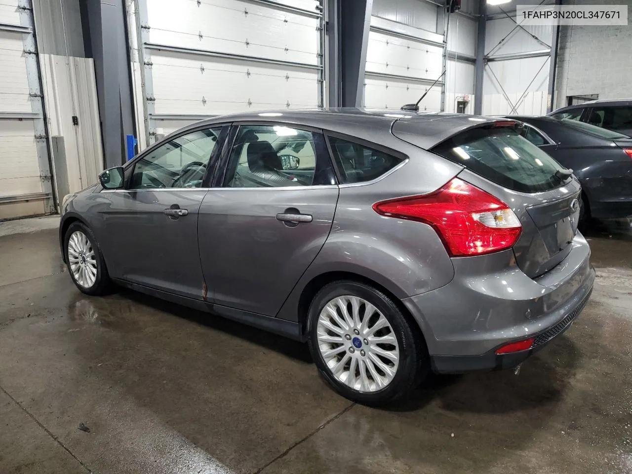 2012 Ford Focus Titanium VIN: 1FAHP3N20CL347671 Lot: 75328754