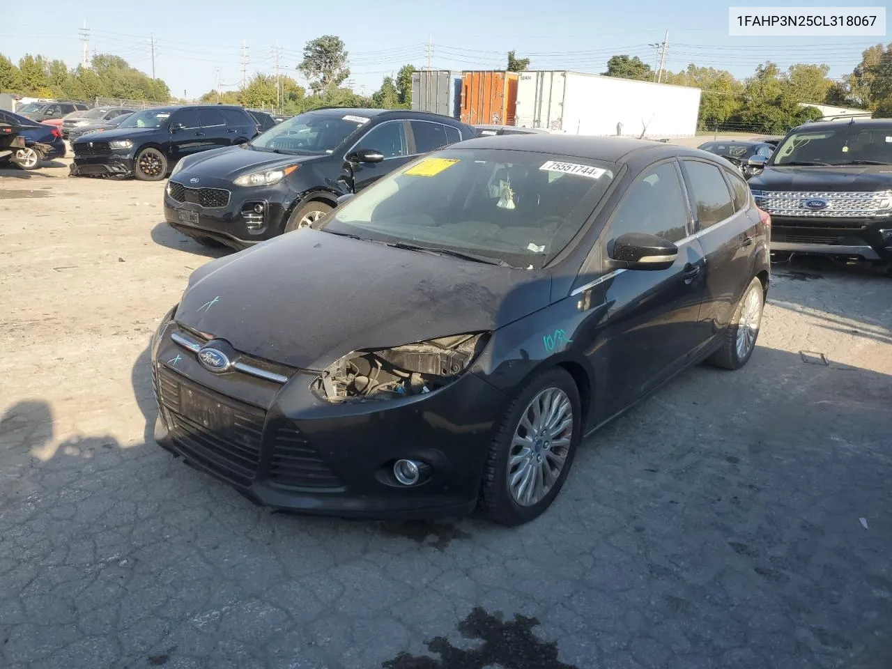 2012 Ford Focus Titanium VIN: 1FAHP3N25CL318067 Lot: 75551744