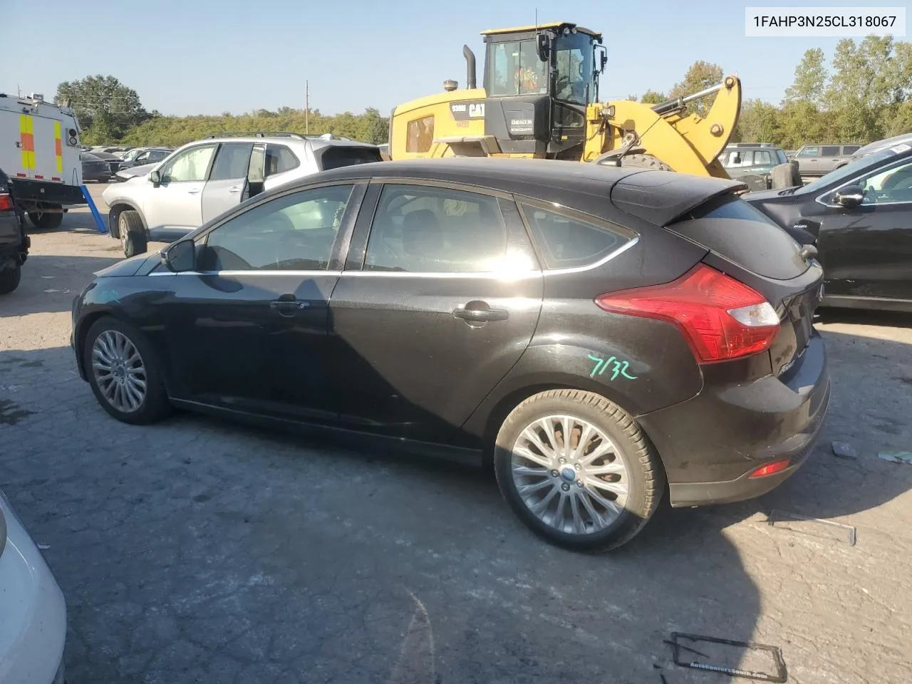 2012 Ford Focus Titanium VIN: 1FAHP3N25CL318067 Lot: 75551744