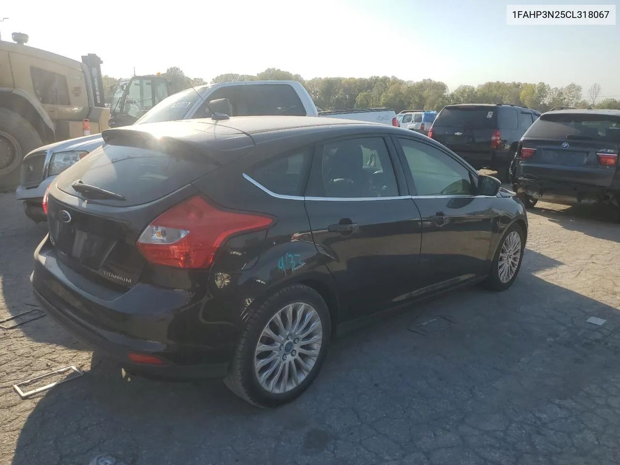 2012 Ford Focus Titanium VIN: 1FAHP3N25CL318067 Lot: 75551744