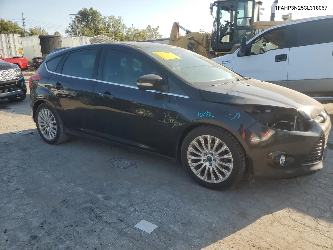 2012 Ford Focus Titanium VIN: 1FAHP3N25CL318067 Lot: 75551744