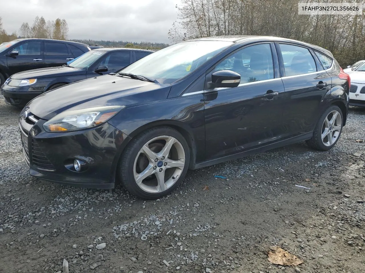 2012 Ford Focus Titanium VIN: 1FAHP3N27CL356626 Lot: 75735034