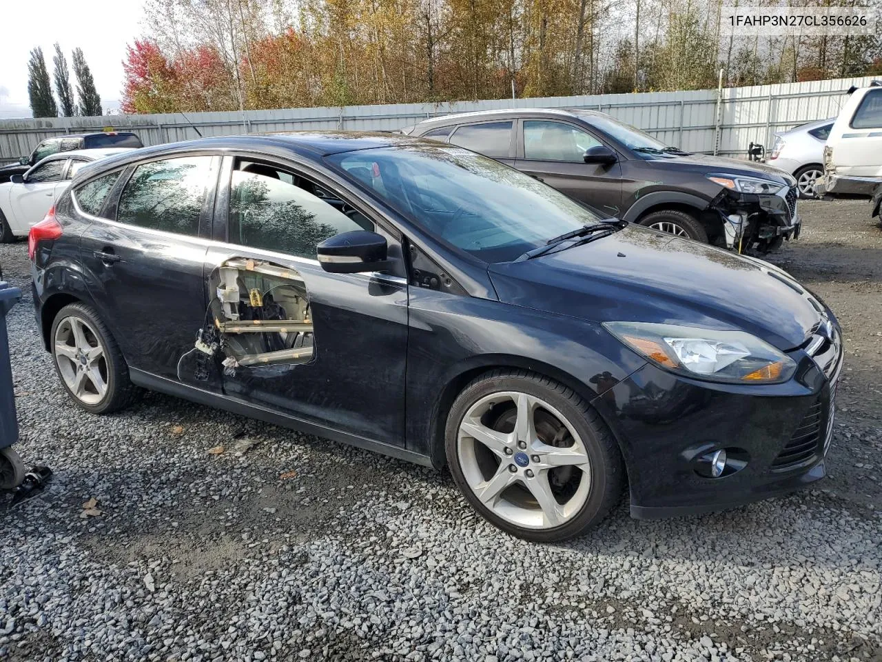 2012 Ford Focus Titanium VIN: 1FAHP3N27CL356626 Lot: 75735034