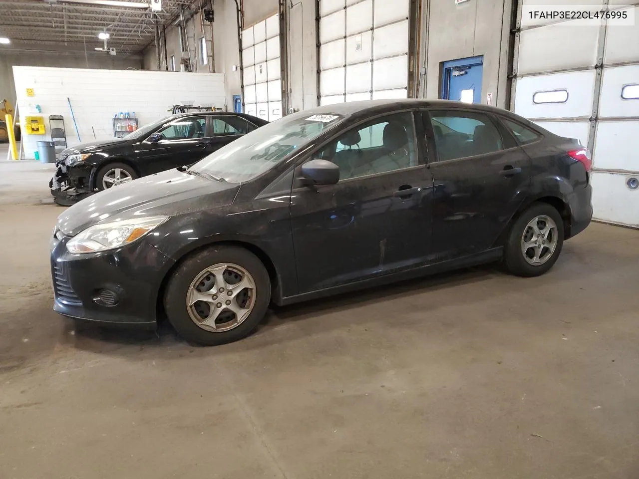 2012 Ford Focus S VIN: 1FAHP3E22CL476995 Lot: 76319674