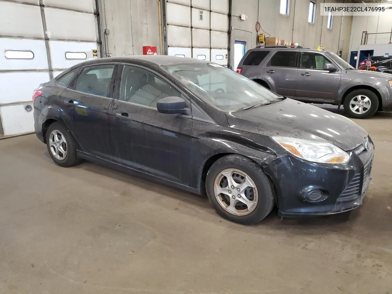 2012 Ford Focus S VIN: 1FAHP3E22CL476995 Lot: 76319674