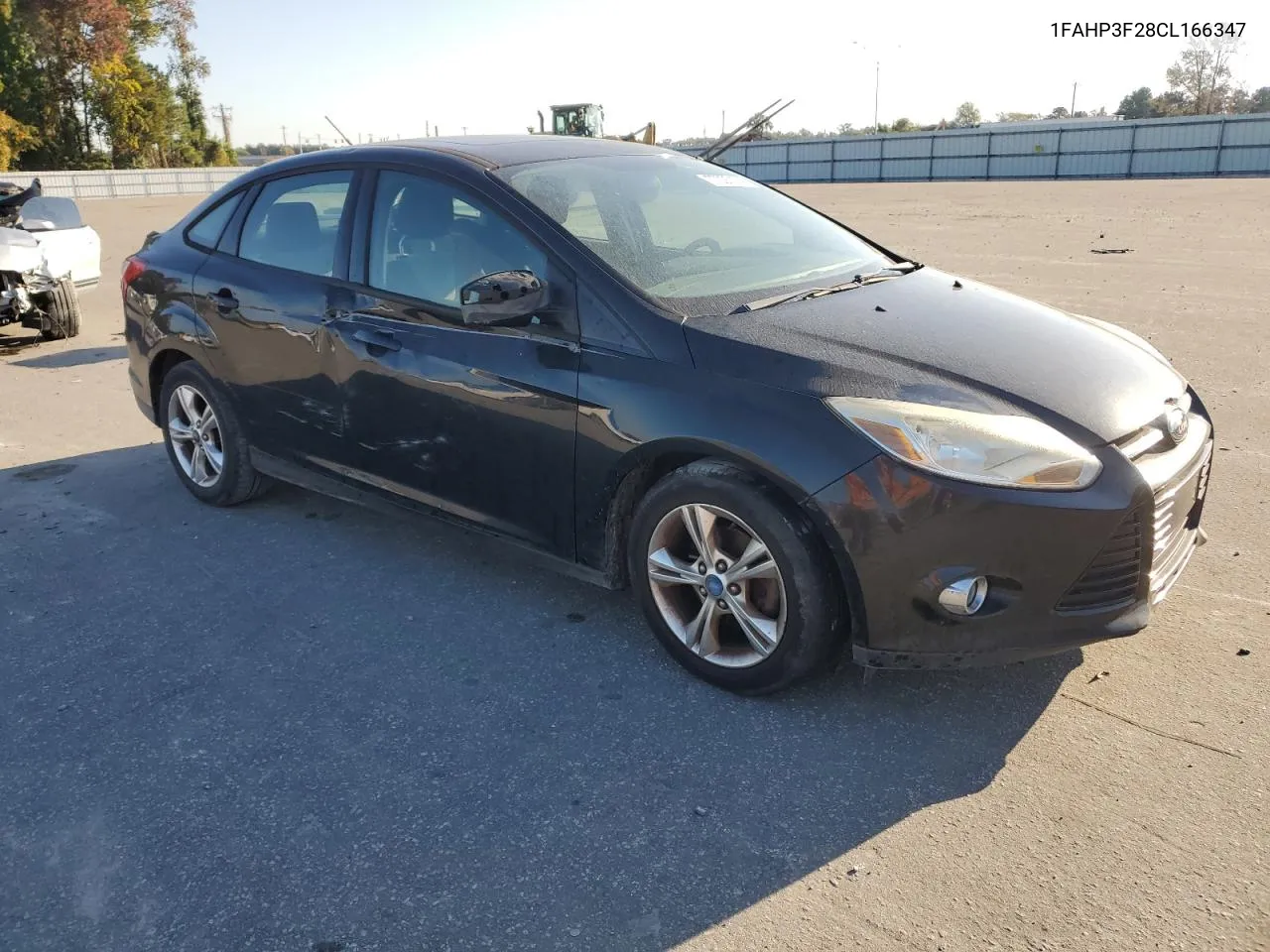 2012 Ford Focus Se VIN: 1FAHP3F28CL166347 Lot: 77097124