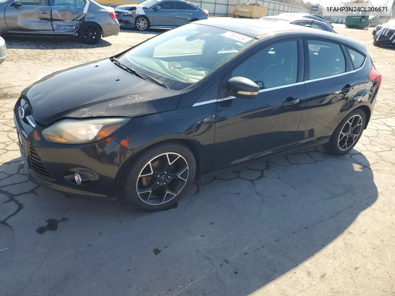 2012 Ford Focus Titanium VIN: 1FAHP3N24CL306671 Lot: 77557234