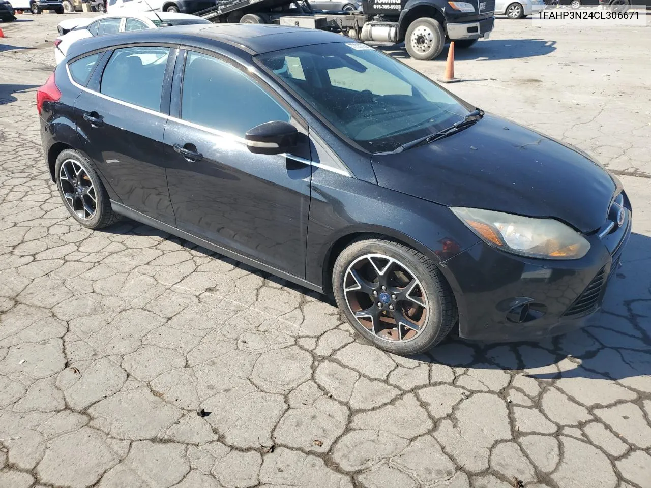 2012 Ford Focus Titanium VIN: 1FAHP3N24CL306671 Lot: 77557234