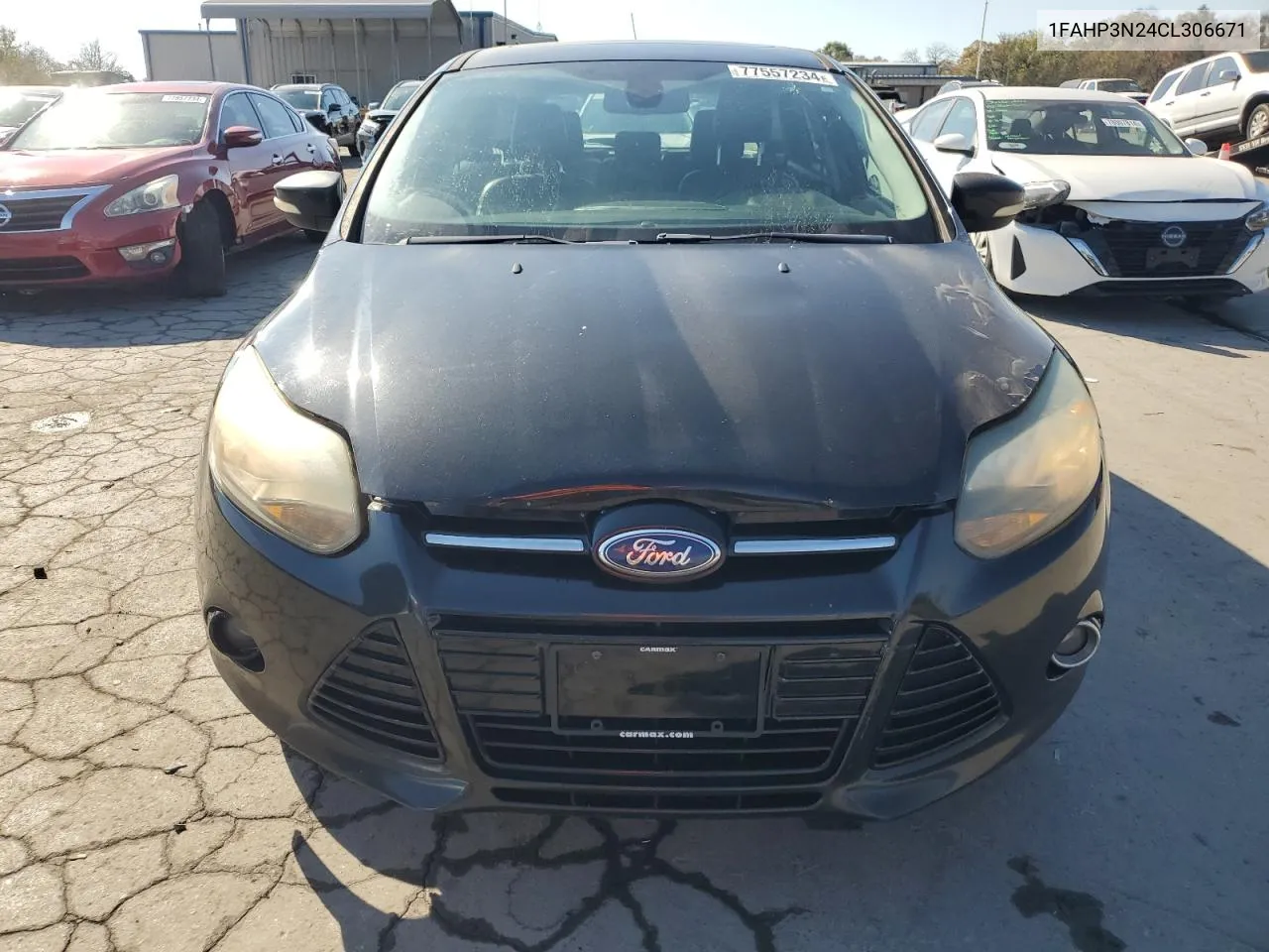 2012 Ford Focus Titanium VIN: 1FAHP3N24CL306671 Lot: 77557234