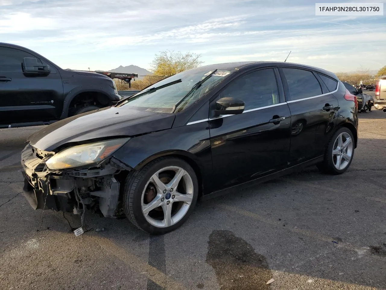 2012 Ford Focus Titanium VIN: 1FAHP3N28CL301750 Lot: 77646424