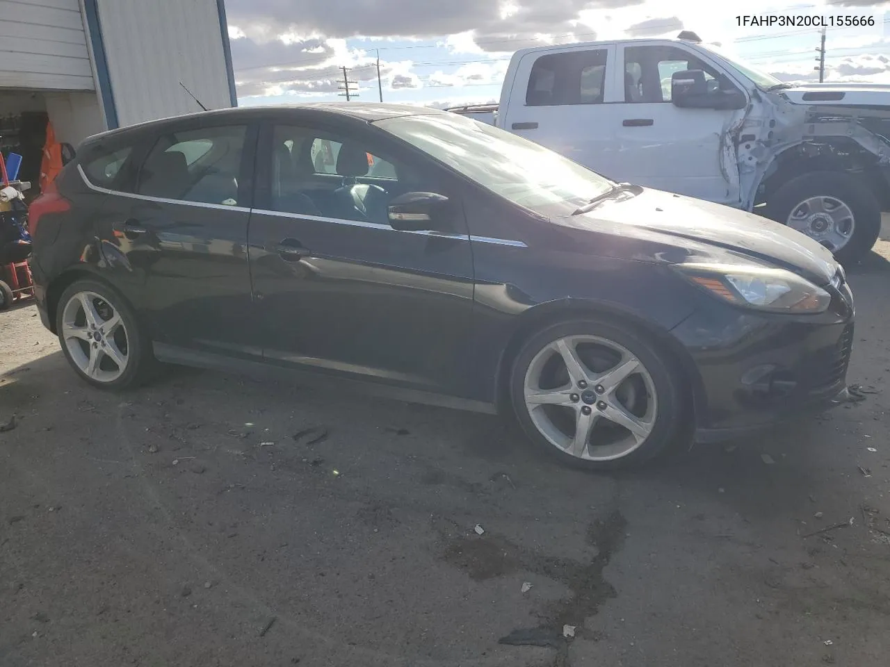 2012 Ford Focus Titanium VIN: 1FAHP3N20CL155666 Lot: 80555984