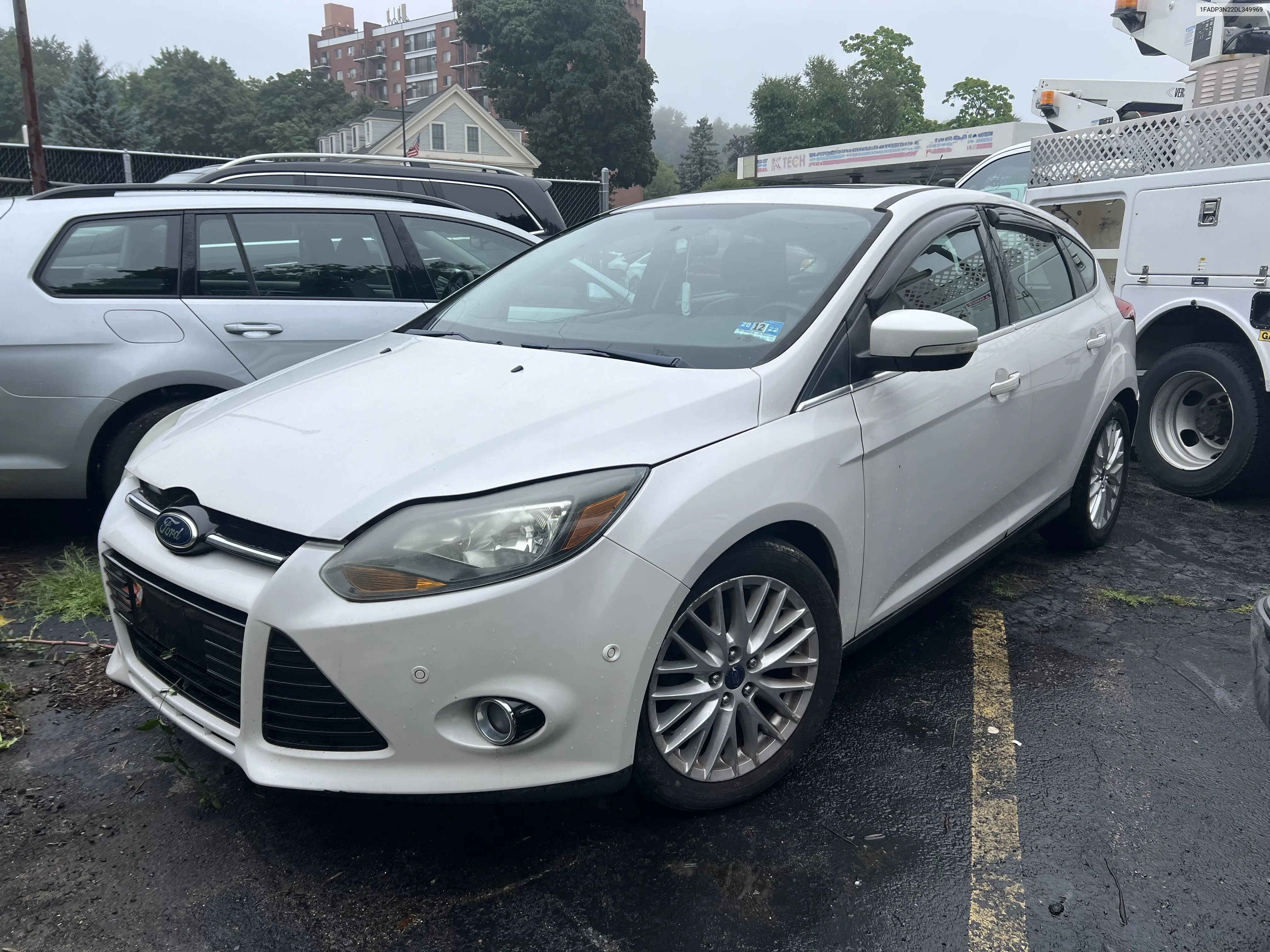 2013 Ford Focus Titanium VIN: 1FADP3N22DL349969 Lot: 40703755