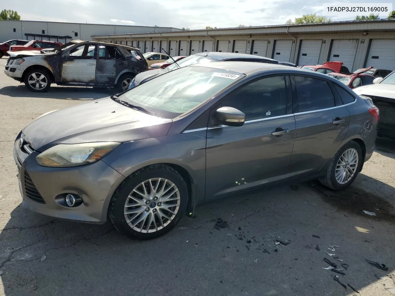 2013 Ford Focus Titanium VIN: 1FADP3J27DL169005 Lot: 68345834