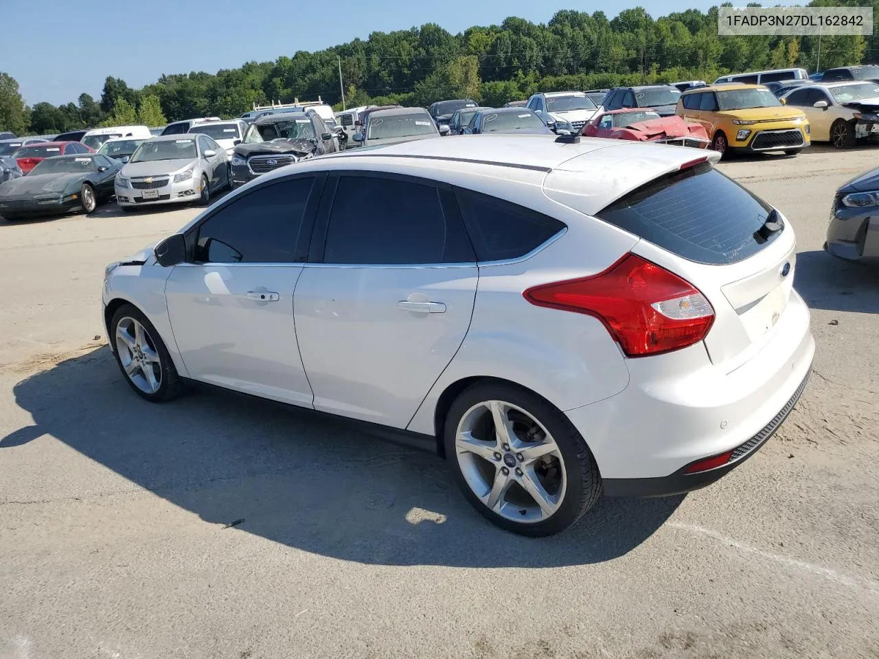 2013 Ford Focus Titanium VIN: 1FADP3N27DL162842 Lot: 68875384