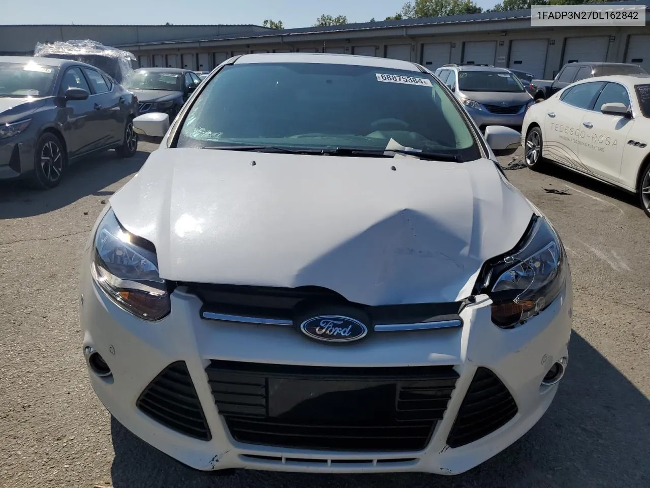 2013 Ford Focus Titanium VIN: 1FADP3N27DL162842 Lot: 68875384