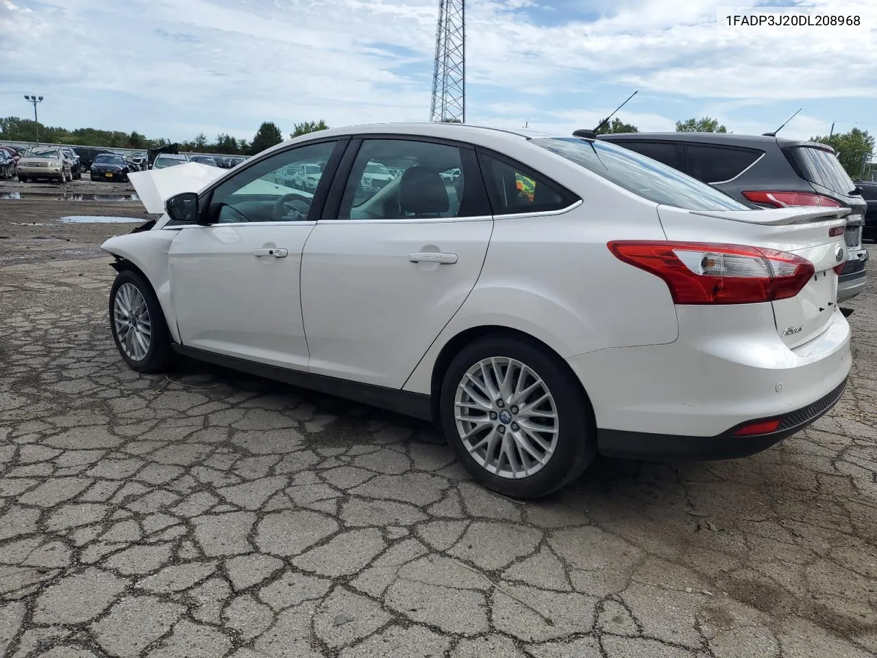 2013 Ford Focus Titanium VIN: 1FADP3J20DL208968 Lot: 69159384