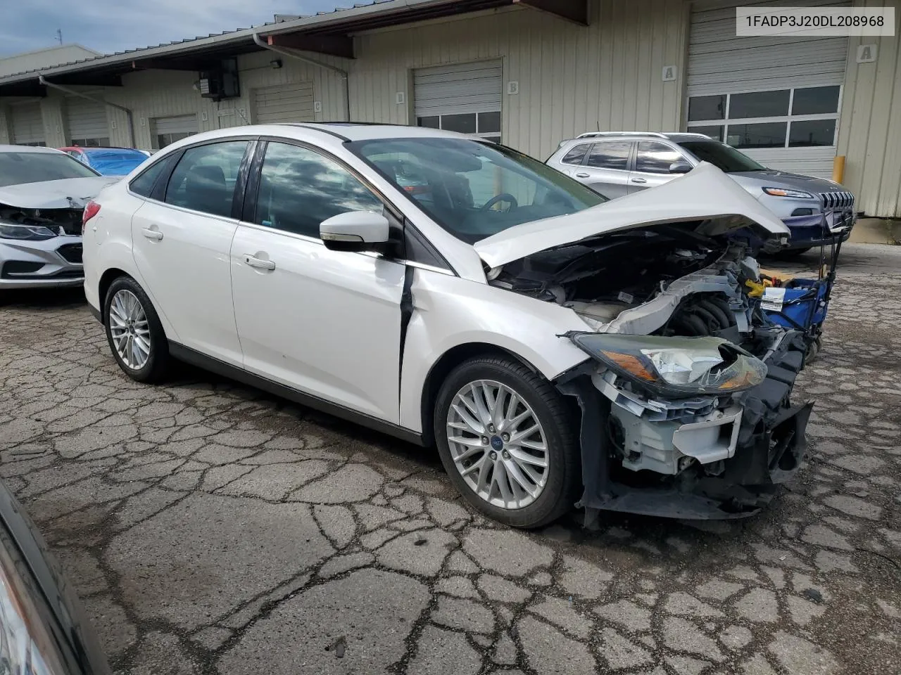 2013 Ford Focus Titanium VIN: 1FADP3J20DL208968 Lot: 69159384