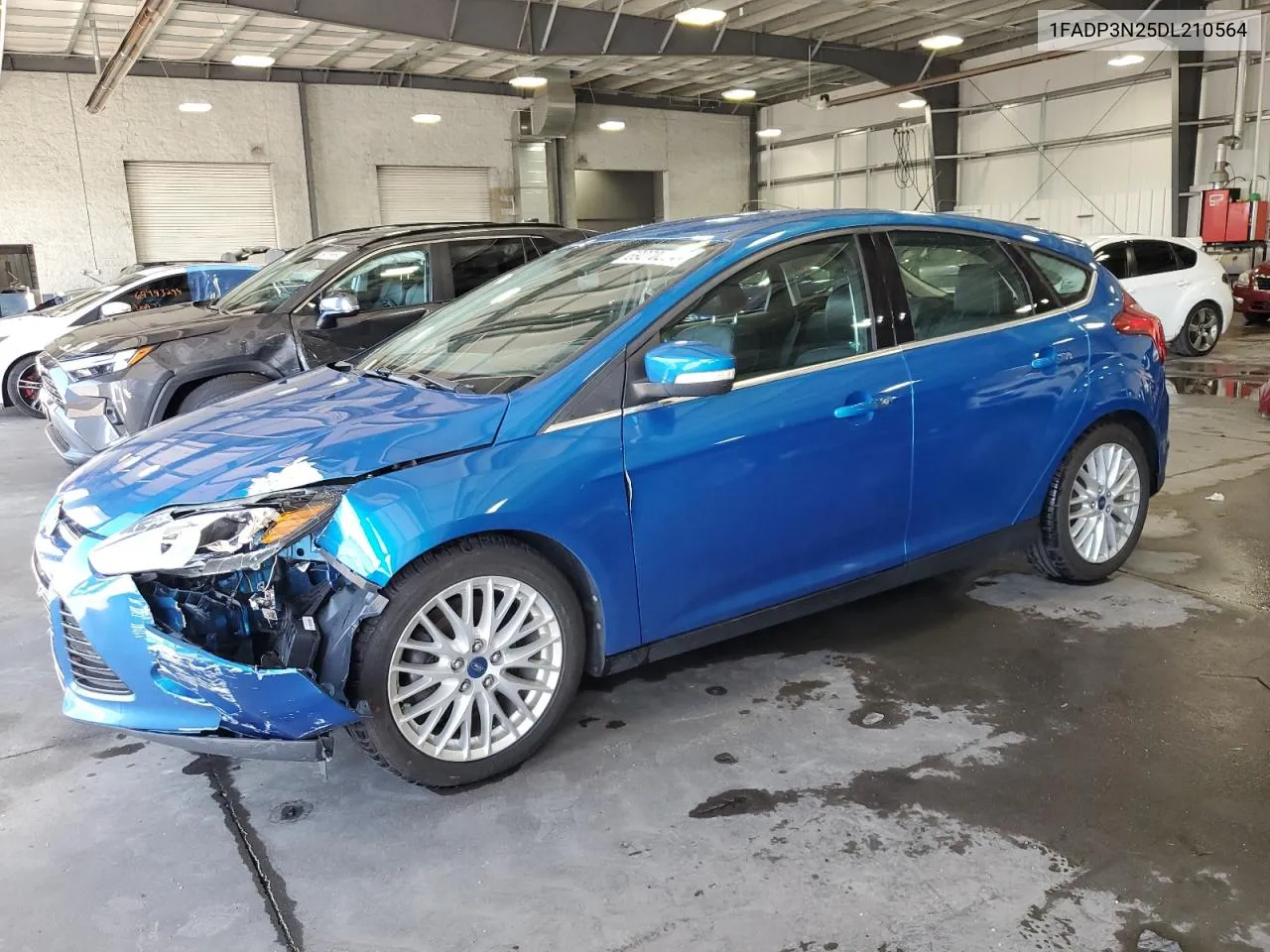 2013 Ford Focus Titanium VIN: 1FADP3N25DL210564 Lot: 69270204