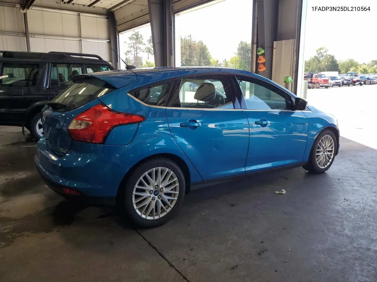 2013 Ford Focus Titanium VIN: 1FADP3N25DL210564 Lot: 69270204