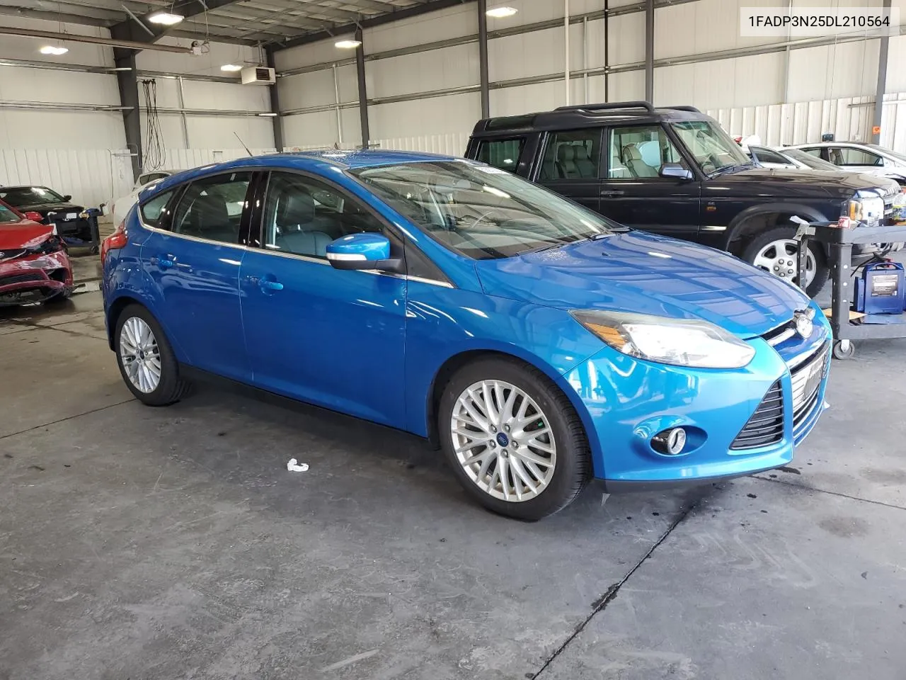 2013 Ford Focus Titanium VIN: 1FADP3N25DL210564 Lot: 69270204