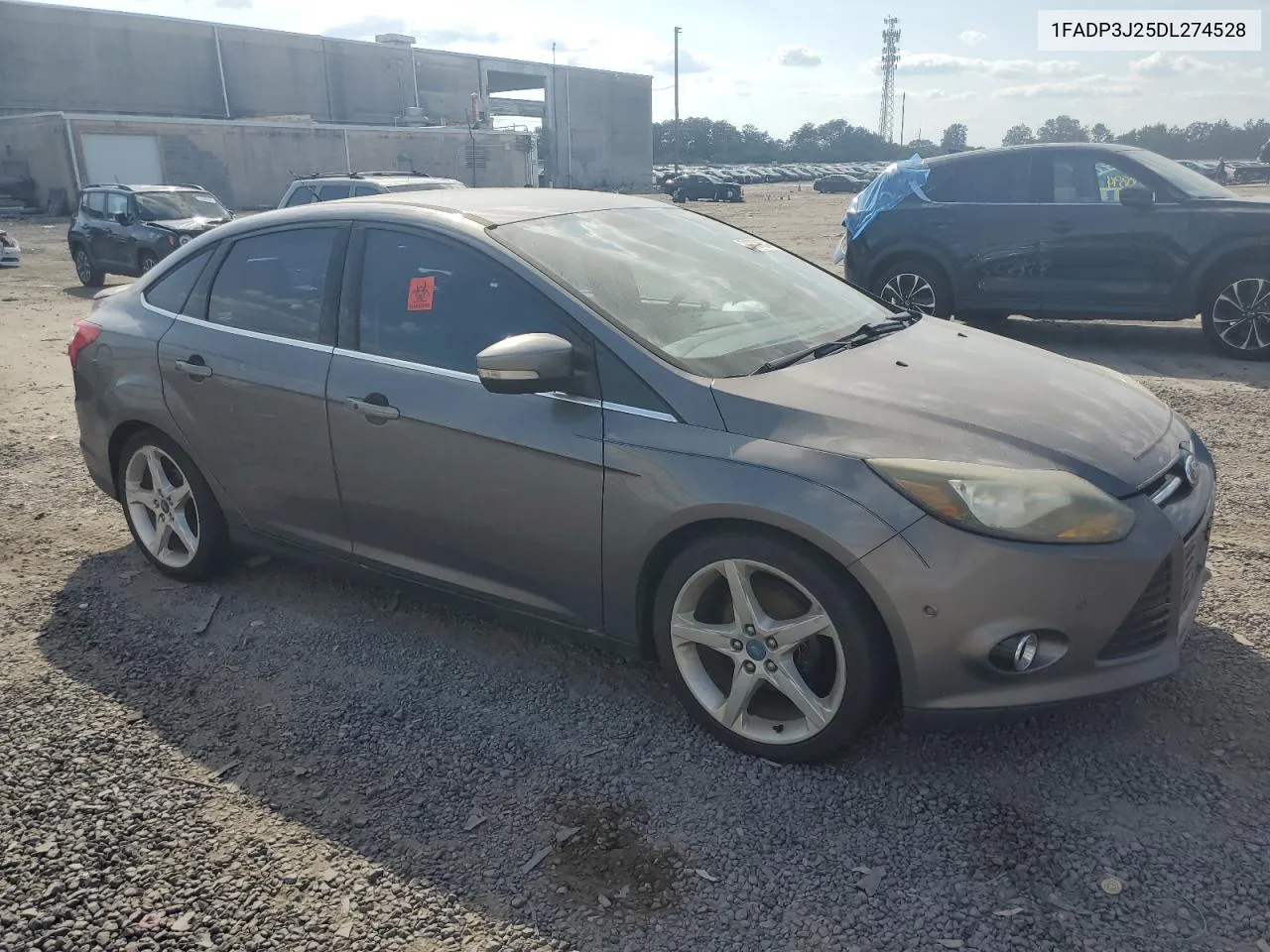 2013 Ford Focus Titanium VIN: 1FADP3J25DL274528 Lot: 71003654