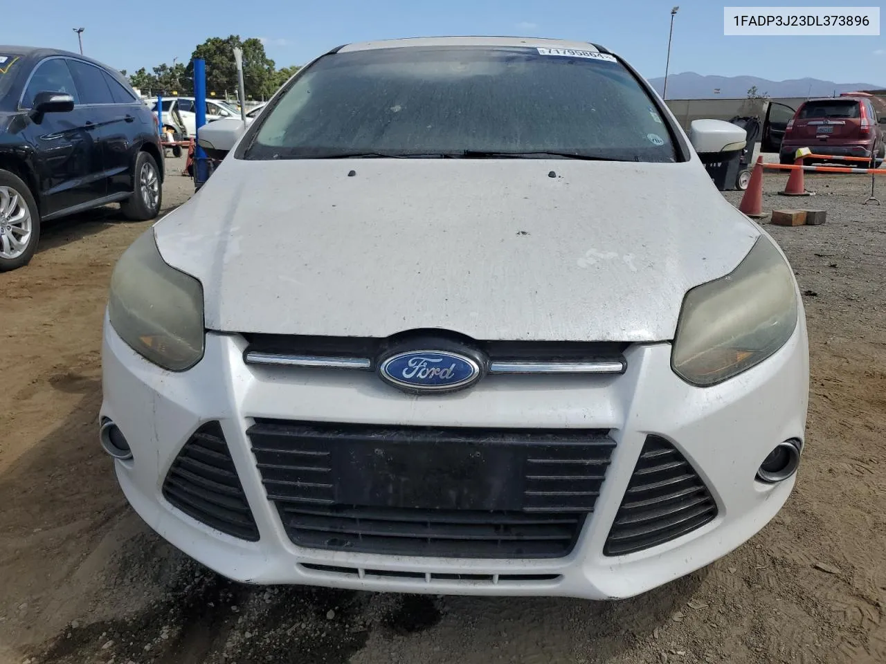 2013 Ford Focus Titanium VIN: 1FADP3J23DL373896 Lot: 71795864