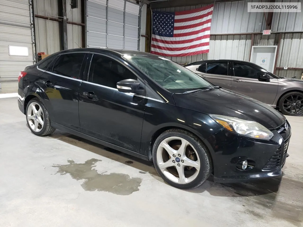 2013 Ford Focus Titanium VIN: 1FADP3J20DL115996 Lot: 72251004