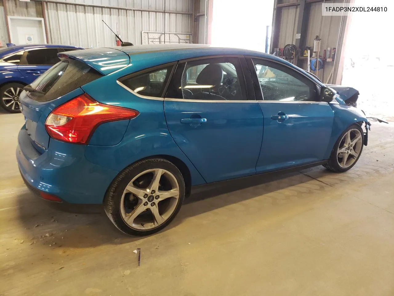 2013 Ford Focus Titanium VIN: 1FADP3N2XDL244810 Lot: 72256034