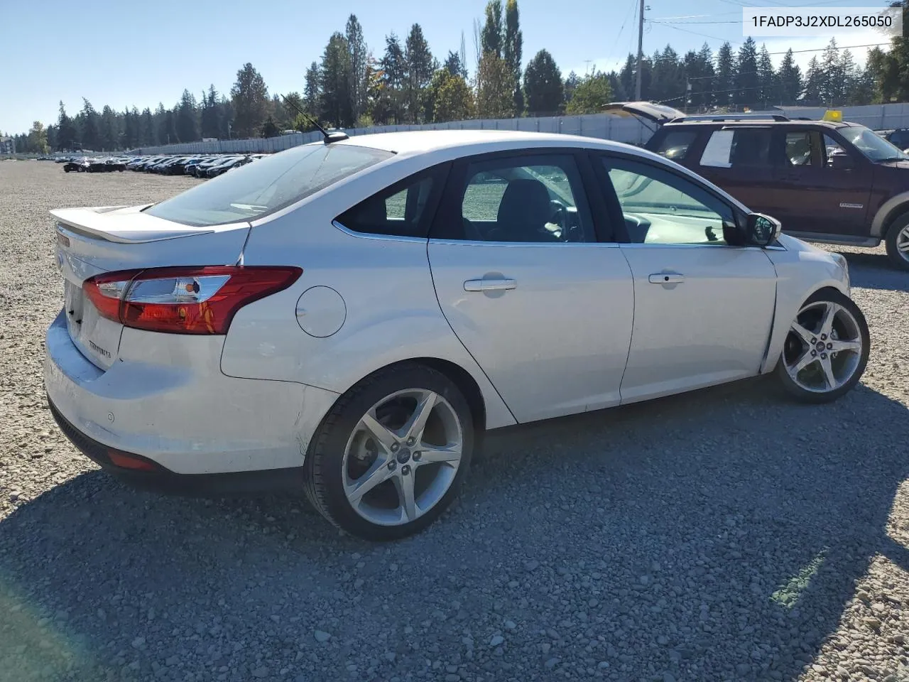 2013 Ford Focus Titanium VIN: 1FADP3J2XDL265050 Lot: 72818494