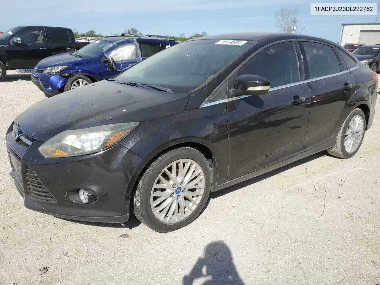 2013 Ford Focus Titanium VIN: 1FADP3J23DL222752 Lot: 73014694