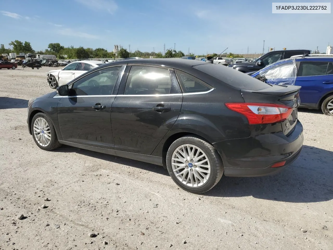 2013 Ford Focus Titanium VIN: 1FADP3J23DL222752 Lot: 73014694