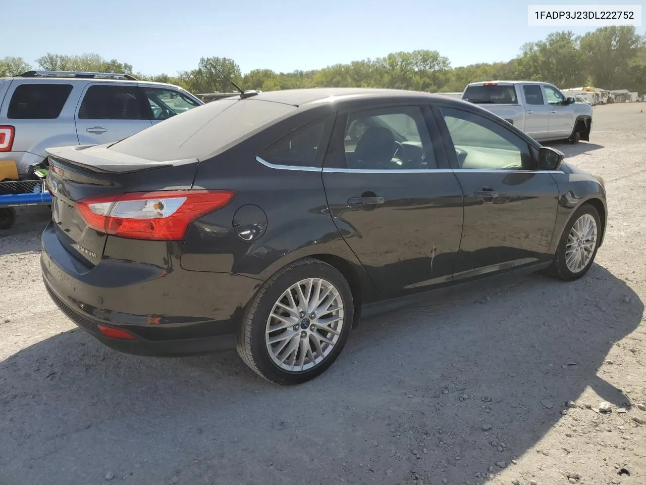 2013 Ford Focus Titanium VIN: 1FADP3J23DL222752 Lot: 73014694