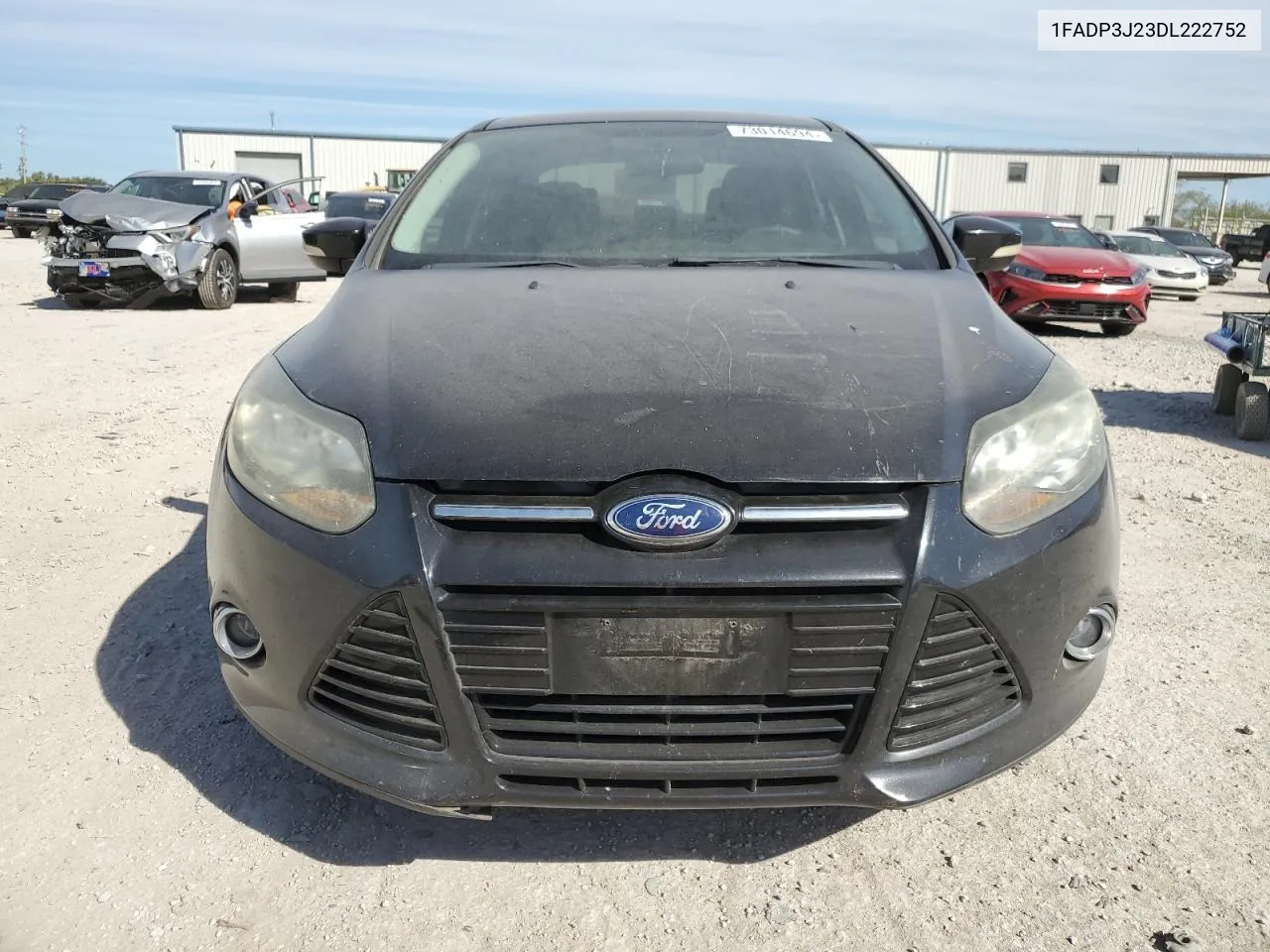 2013 Ford Focus Titanium VIN: 1FADP3J23DL222752 Lot: 73014694