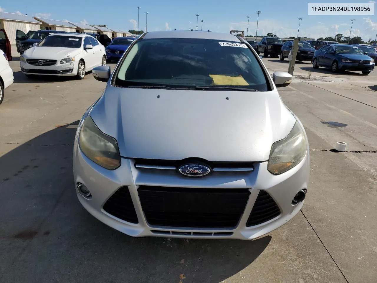 2013 Ford Focus Titanium VIN: 1FADP3N24DL198956 Lot: 73862374