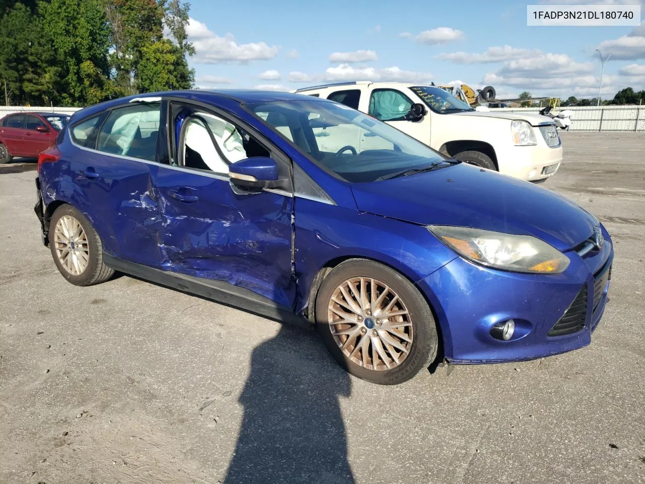 2013 Ford Focus Titanium VIN: 1FADP3N21DL180740 Lot: 74567314