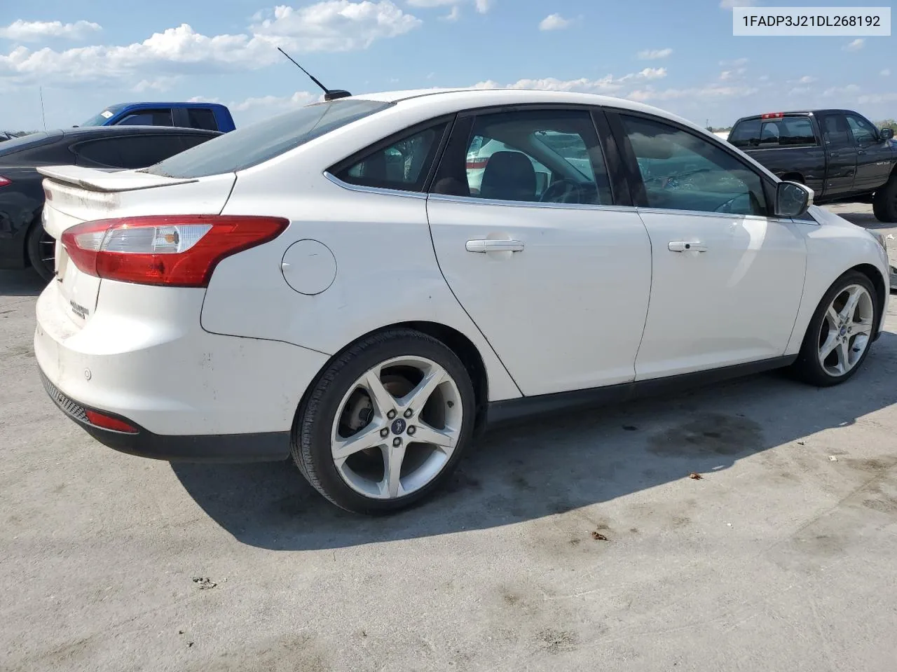 2013 Ford Focus Titanium VIN: 1FADP3J21DL268192 Lot: 74751004