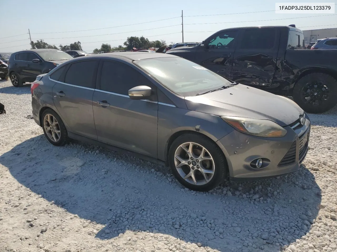 2013 Ford Focus Titanium VIN: 1FADP3J25DL123379 Lot: 75512624