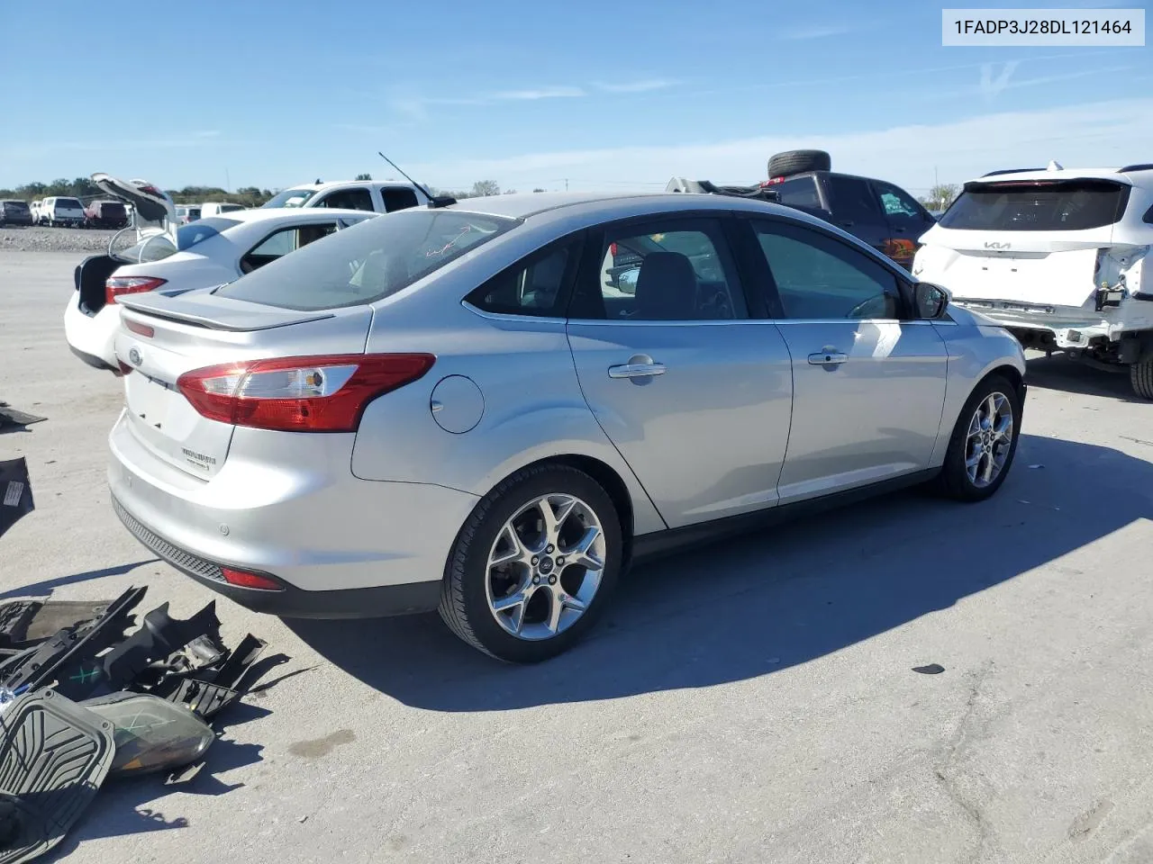 2013 Ford Focus Titanium VIN: 1FADP3J28DL121464 Lot: 75913374