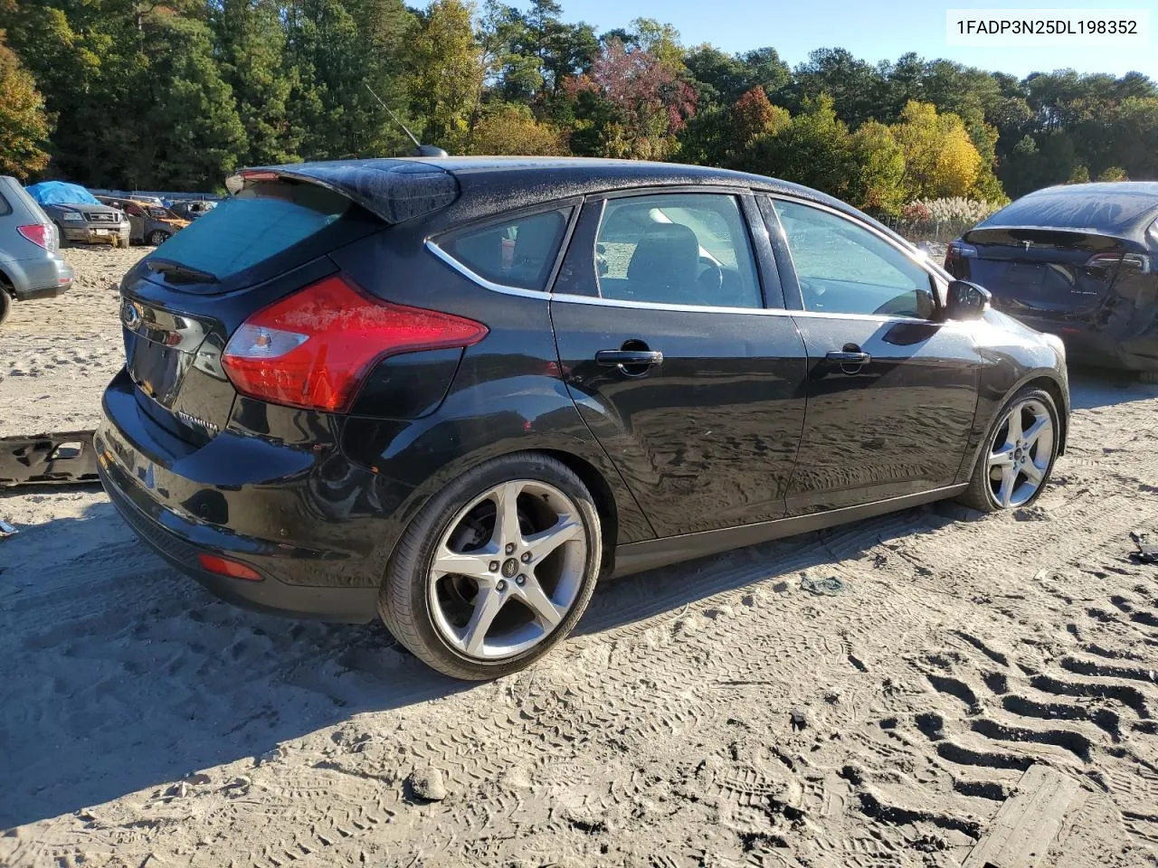 2013 Ford Focus Titanium VIN: 1FADP3N25DL198352 Lot: 76879704