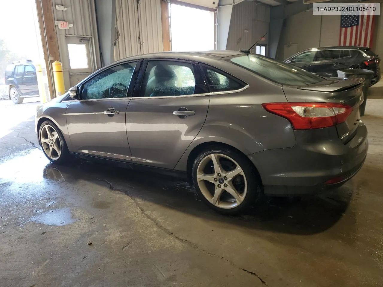 2013 Ford Focus Titanium VIN: 1FADP3J24DL105410 Lot: 77371554