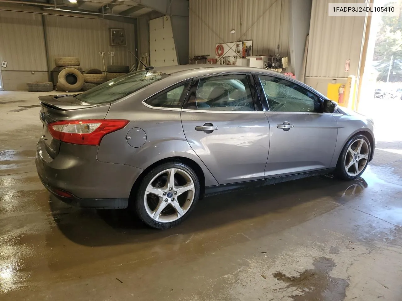 2013 Ford Focus Titanium VIN: 1FADP3J24DL105410 Lot: 77371554