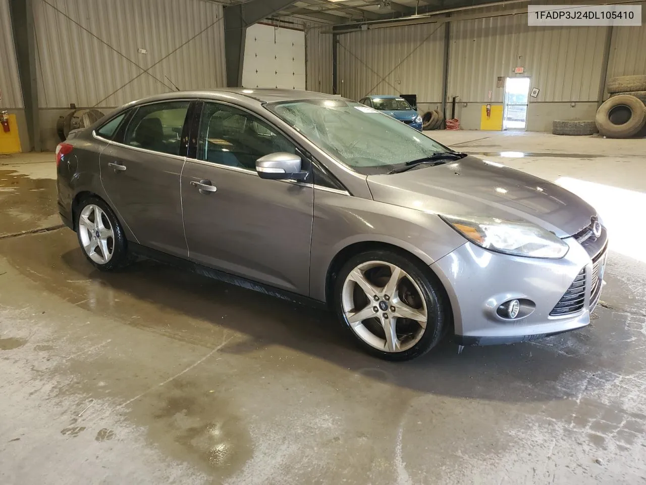 2013 Ford Focus Titanium VIN: 1FADP3J24DL105410 Lot: 77371554