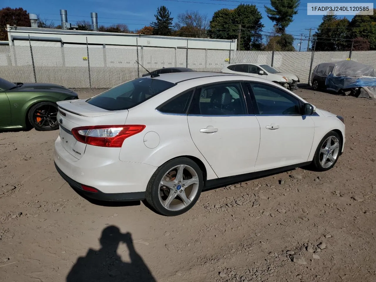 2013 Ford Focus Titanium VIN: 1FADP3J24DL120585 Lot: 77375604